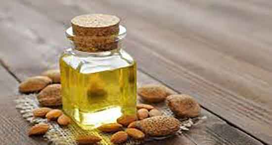 خواص روغن الوک برای مو ؛ روش استفاده روغن بادام تلخ برای موی سر